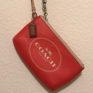 Coach Orange Carriage Wristlet